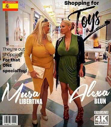 Sexy big tits mature lesbians in the shopping mall.