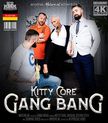 Three strapping guys fuck MILF Kitty Core until they all come on her big tits