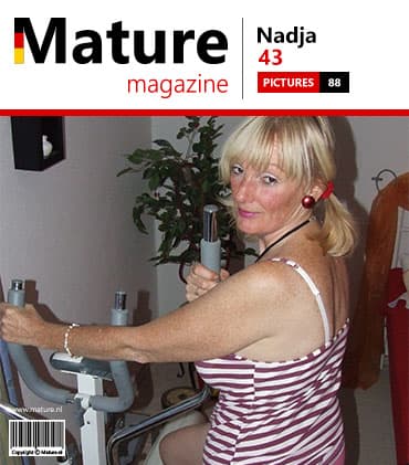 Blonde mature woman does a naked workout and makes herself wet
