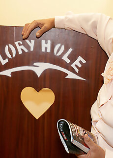 Mature Nanny Sucking A Black Cock Through A Gloryhole